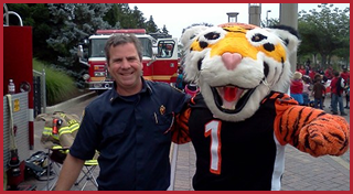 Fireman with Bengal mascot